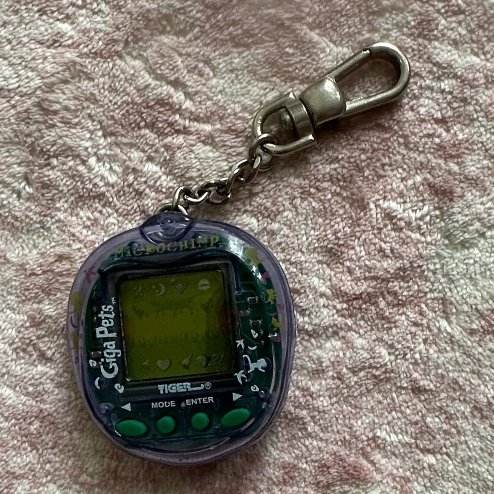 1997 Microchimp Purple Giga Pets Digital Keychain